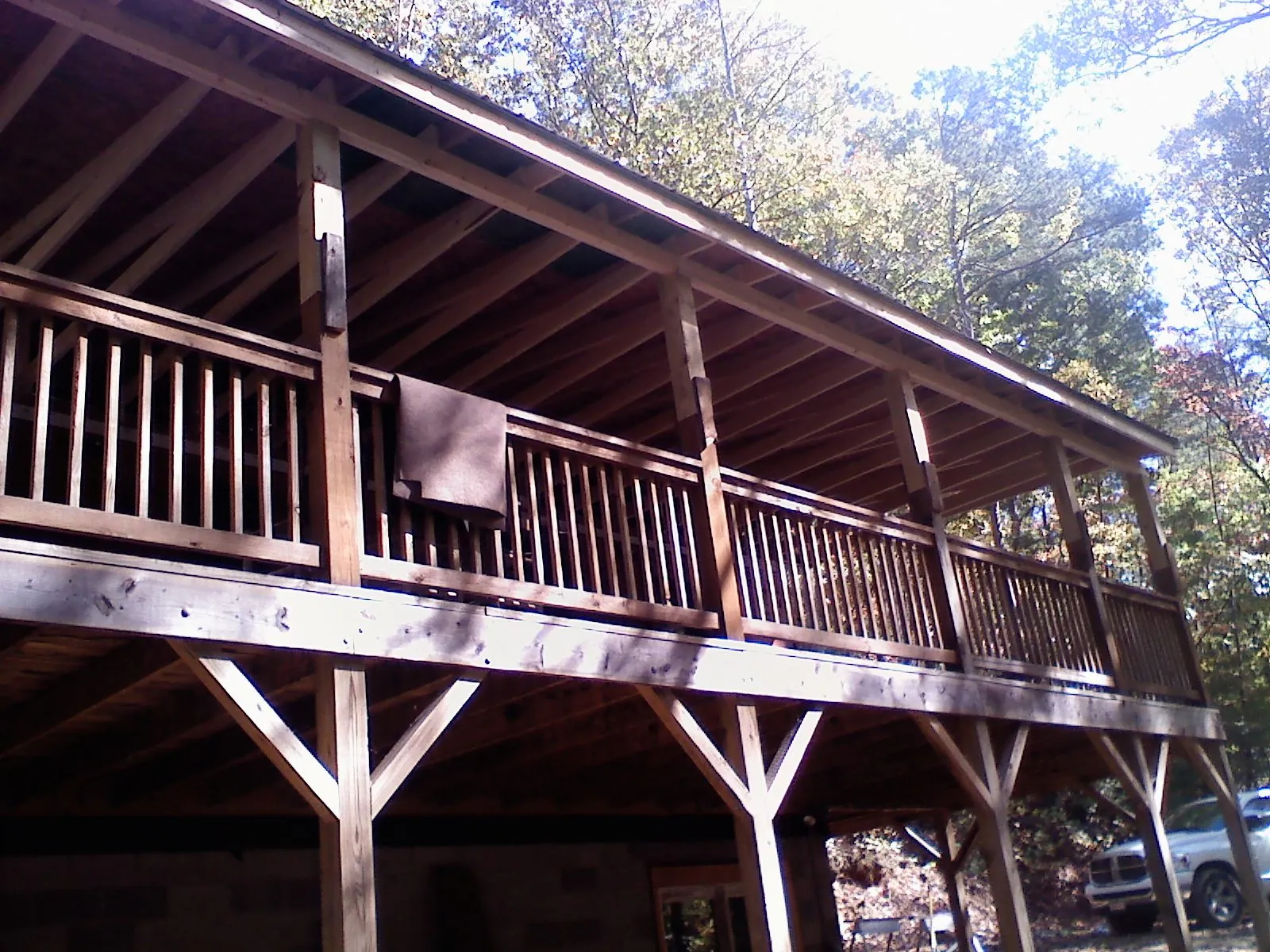 Timber framing under a new elevated porch and deck in East Jewett